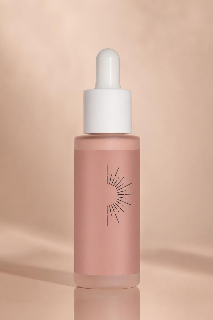 Sun-kissed self-tanning drops bottle